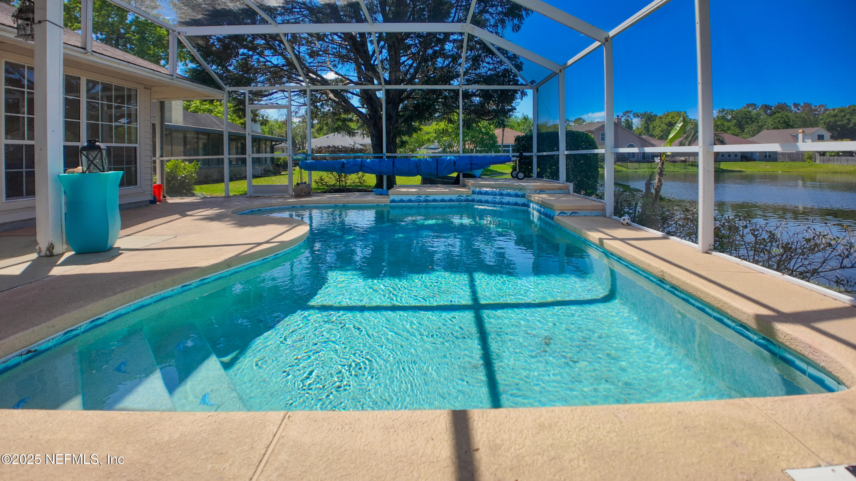 13775 Danforth Drive South Jacksonville, FL 32224 - Photo 4 of 38 a view of a swimming pool with a patio