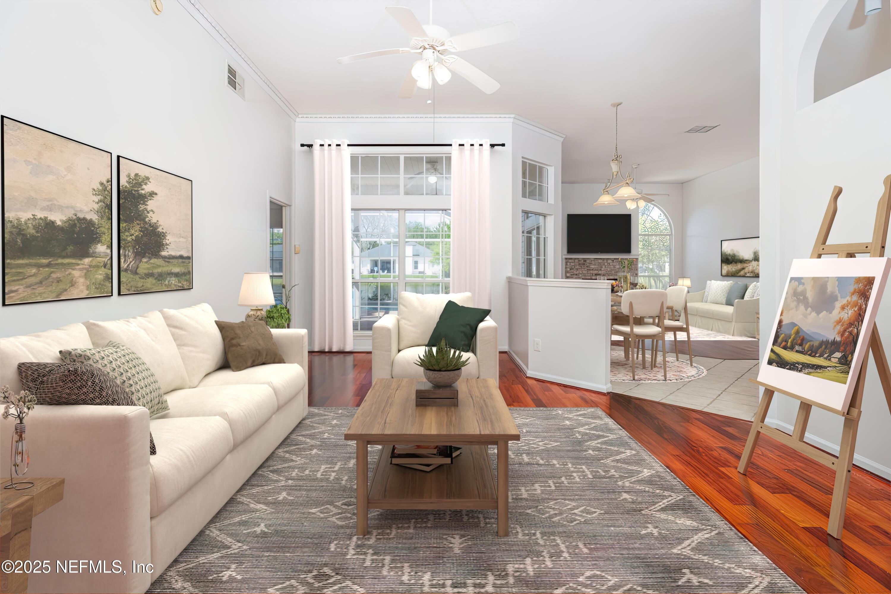 13775 Danforth Drive South Jacksonville, FL 32224 - Photo 5 of 38 a living room with furniture a flat screen tv and a large window
