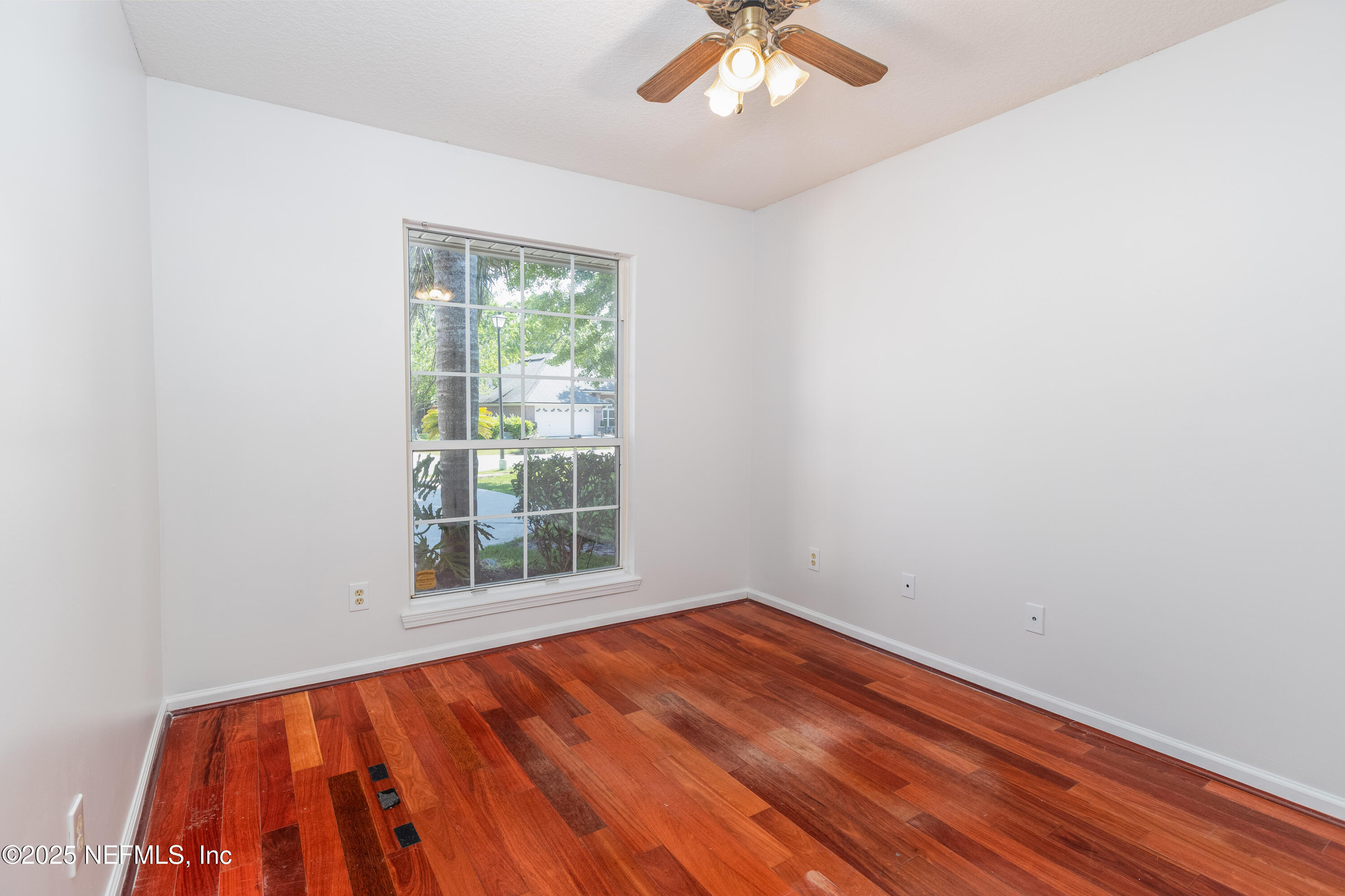 13775 Danforth Drive South Jacksonville, FL 32224 - Photo 8 of 38 an empty room with a window