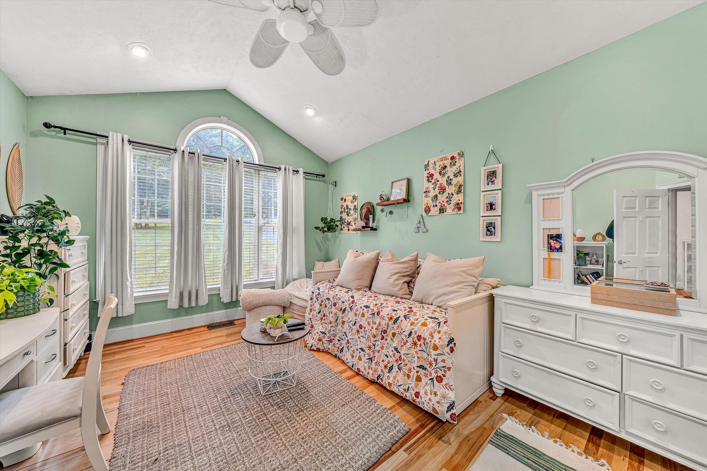 239 Cedar Bay Road Union Hall, VA 24176 - Photo 16 of 51 a bedroom with furniture and a large window