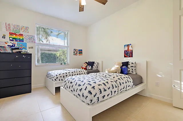 a bedroom with a bed and a closet