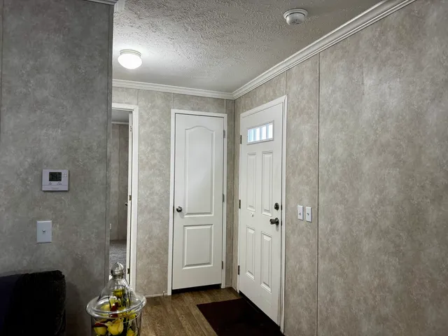 a bathroom with a shower and a sink