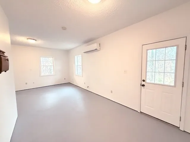an empty room with windows
