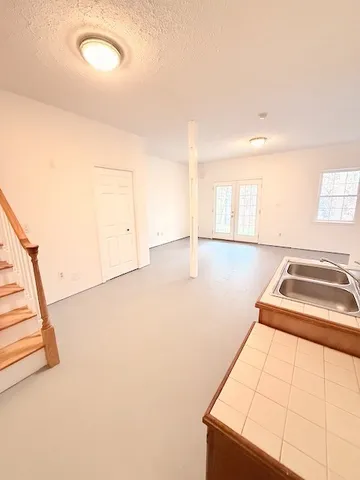 a view of a kitchen with a sink
