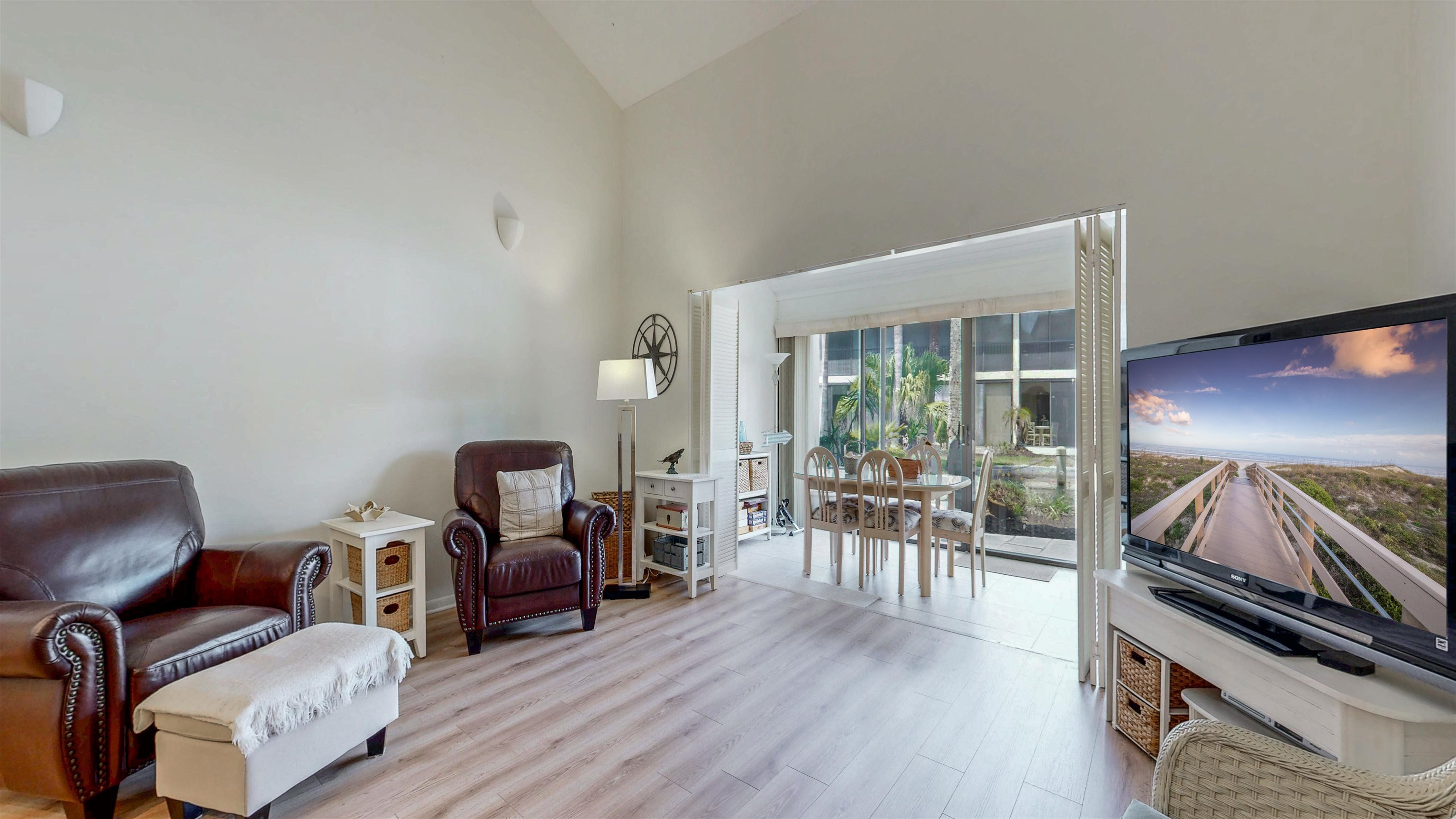82 Village Las Palmas Circle St. Augustine, FL 32080 - Photo 20 of 58 Sitting room featuring light wood-style flooring and vaulted ceiling
