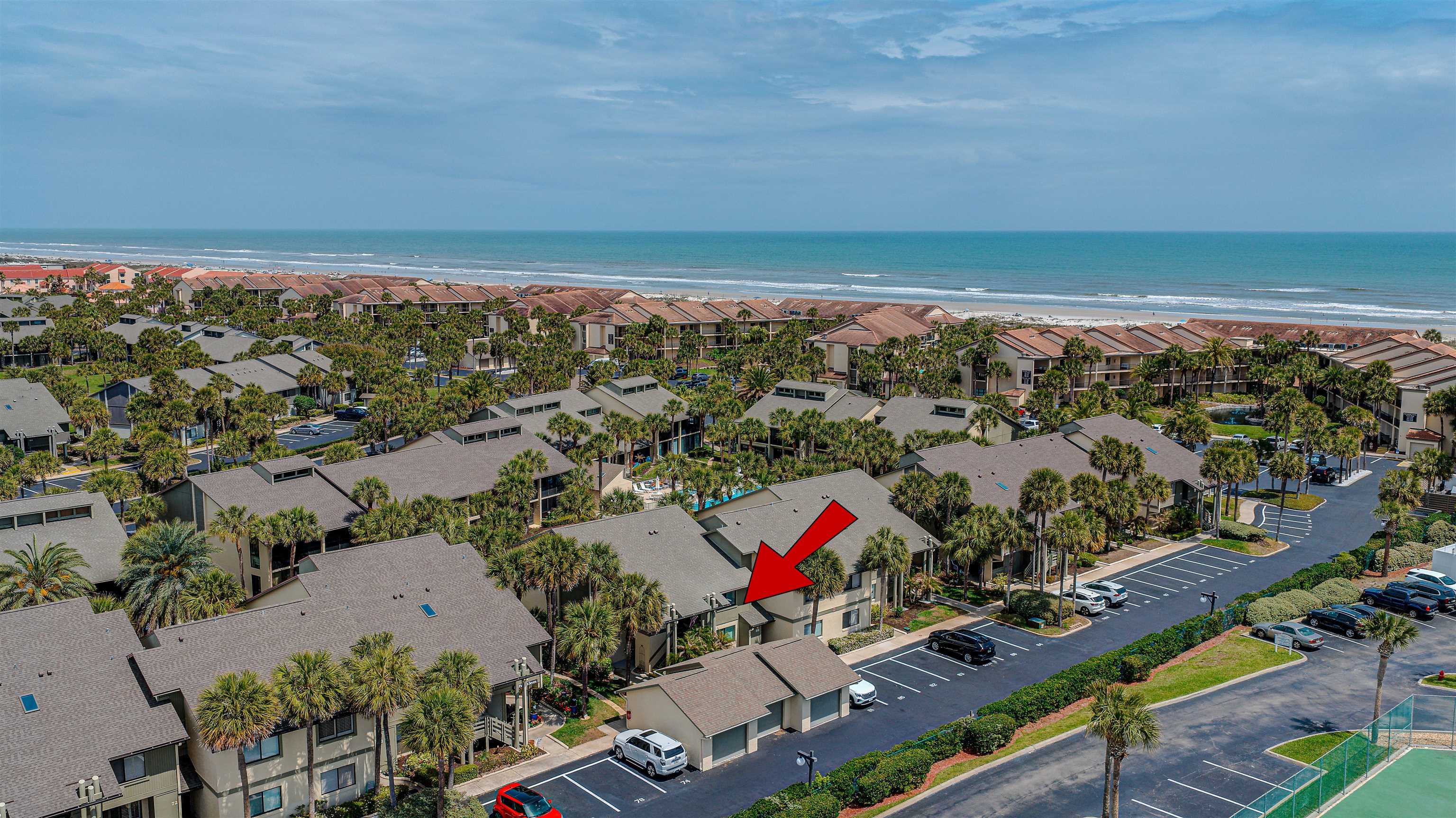 82 Village Las Palmas Circle St. Augustine, FL 32080 - Photo 3 of 58 Aerial view of property's location with a large body of water and nearby suburban area