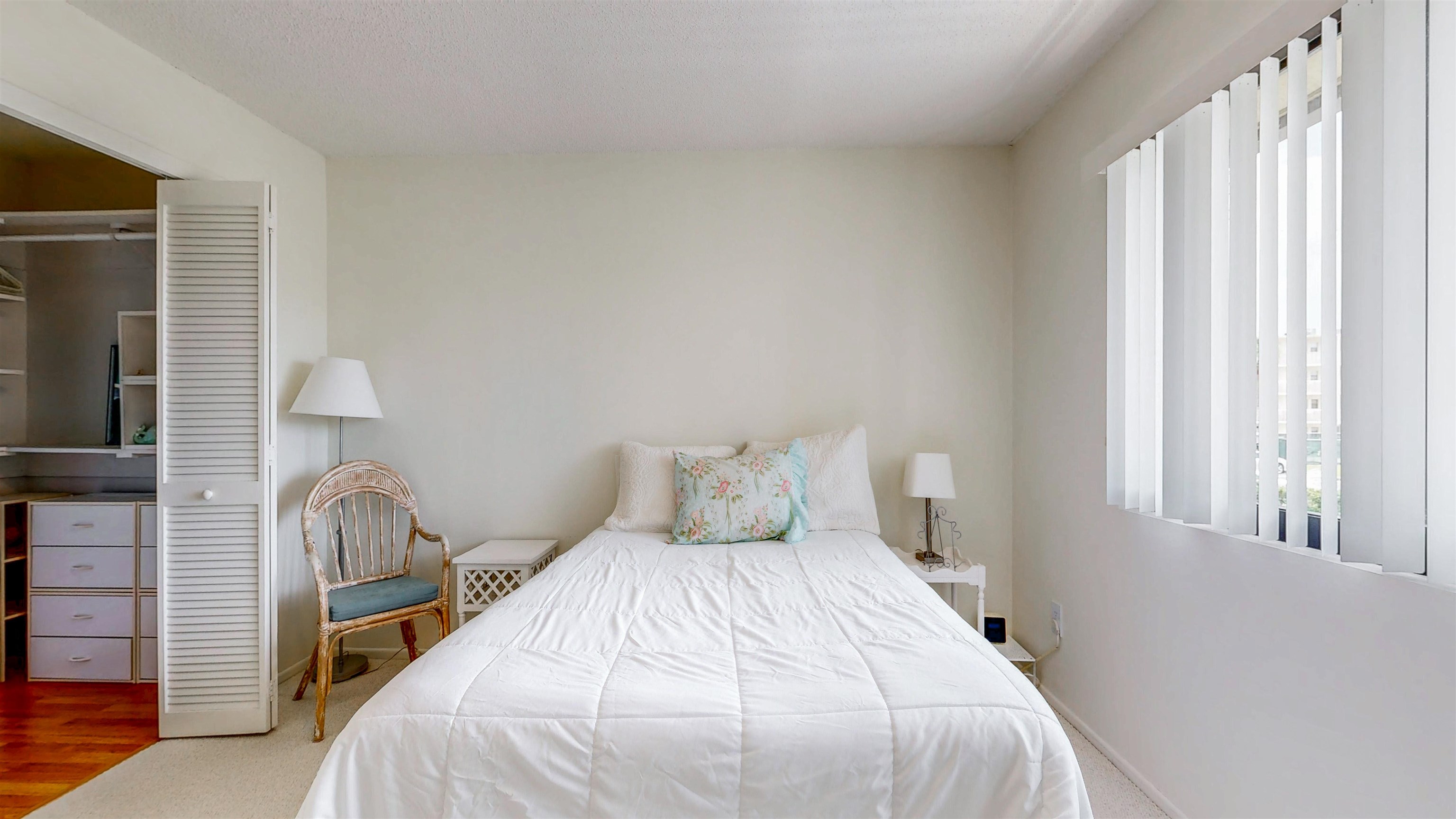 82 Village Las Palmas Circle St. Augustine, FL 32080 - Photo 30 of 58 Bedroom featuring a closet and light carpet