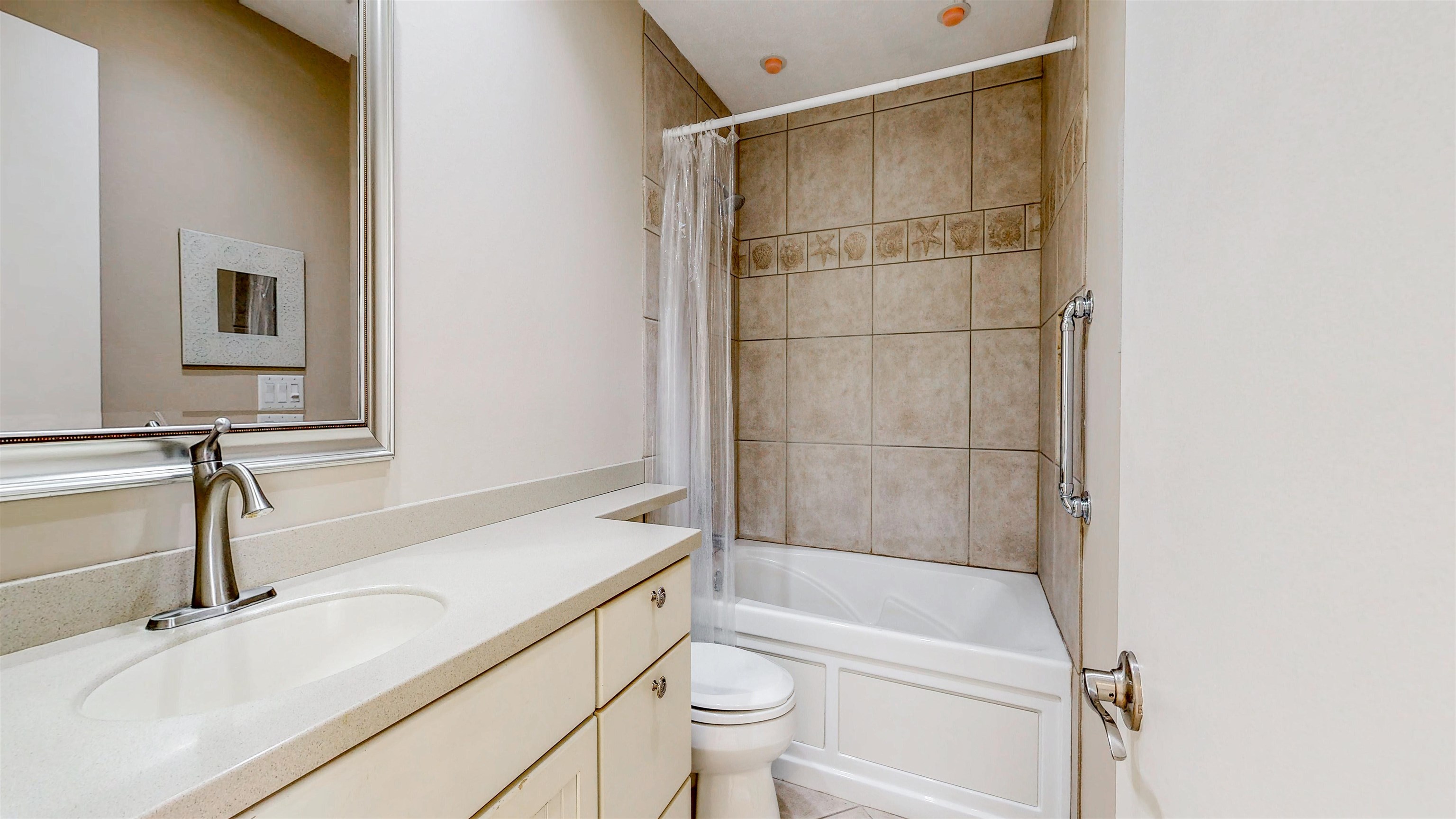82 Village Las Palmas Circle St. Augustine, FL 32080 - Photo 37 of 58 Full bathroom featuring vanity and shower / bath combo with shower curtain