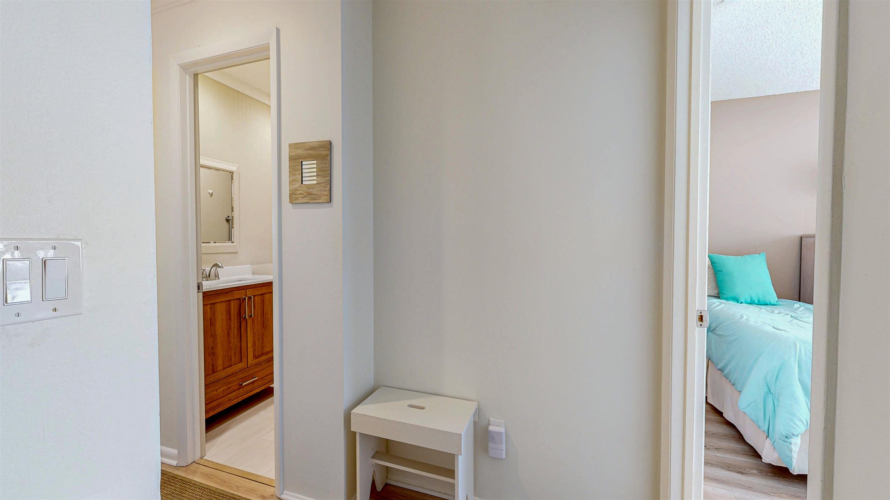 82 Village Las Palmas Circle St. Augustine, FL 32080 - Photo 46 of 58 Corridor featuring light wood finished floors and baseboards