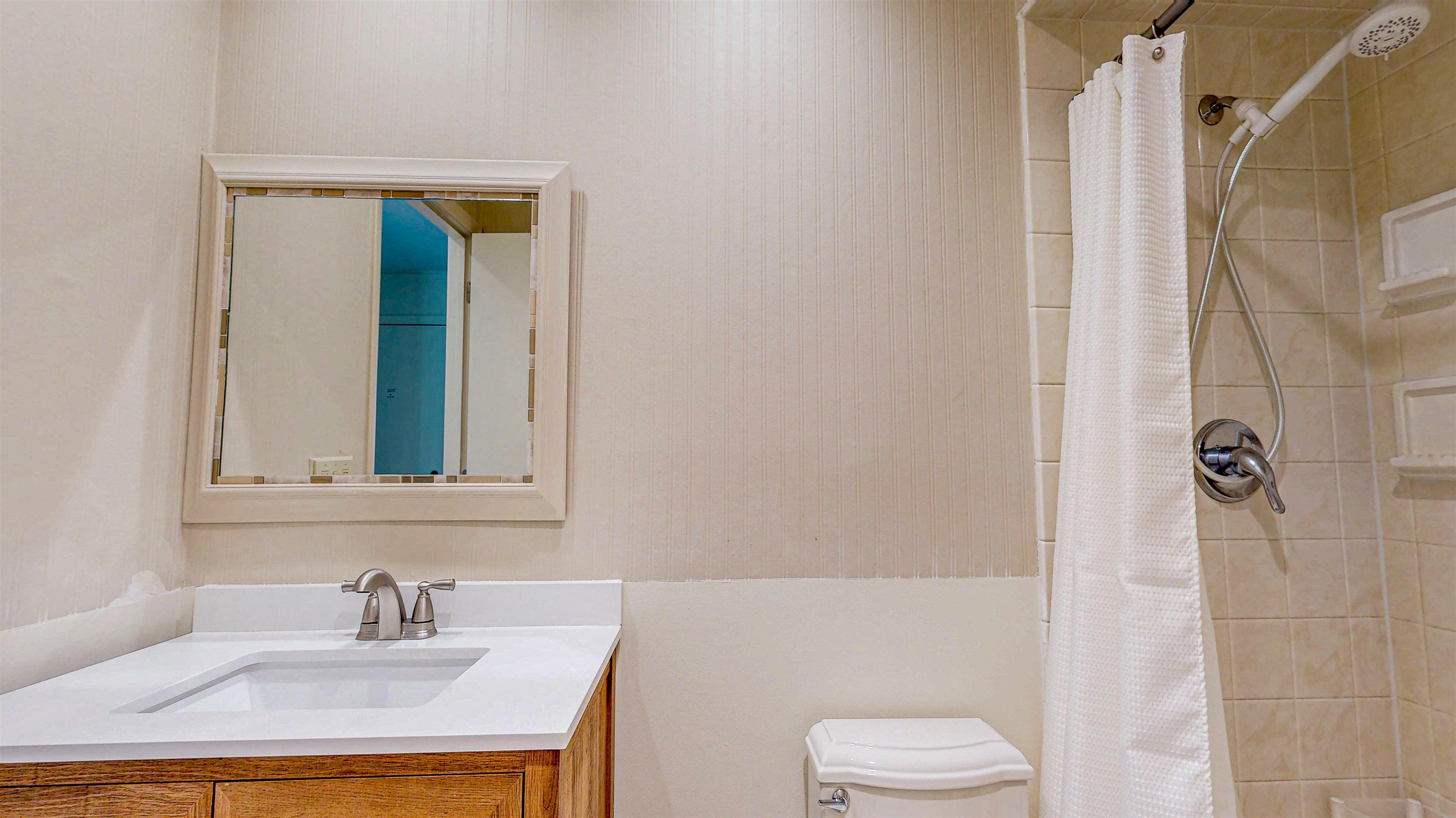 82 Village Las Palmas Circle St. Augustine, FL 32080 - Photo 57 of 58 Full bathroom with vanity and tiled shower