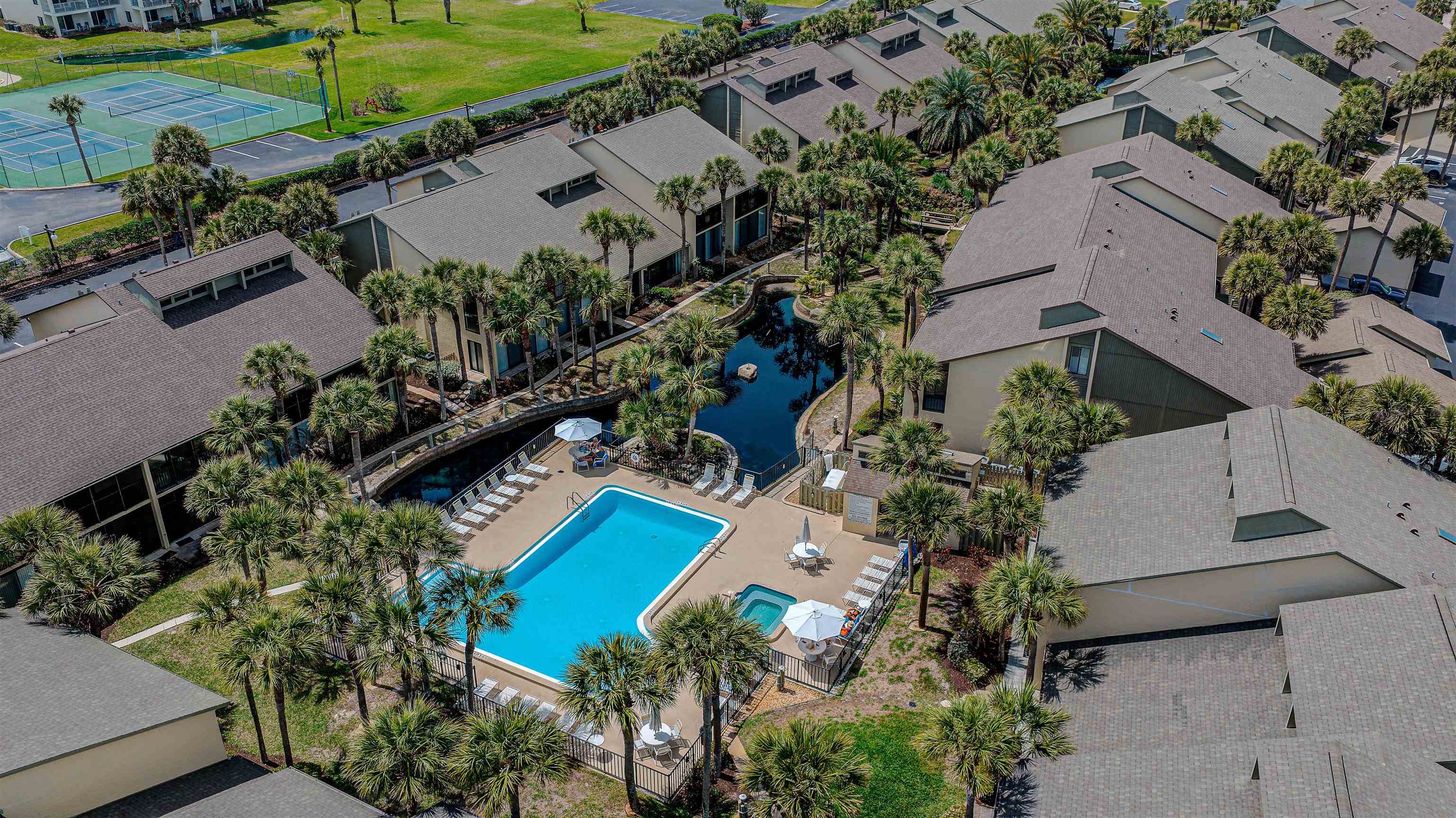 82 Village Las Palmas Circle St. Augustine, FL 32080 - Photo 7 of 58 Aerial view of a pool