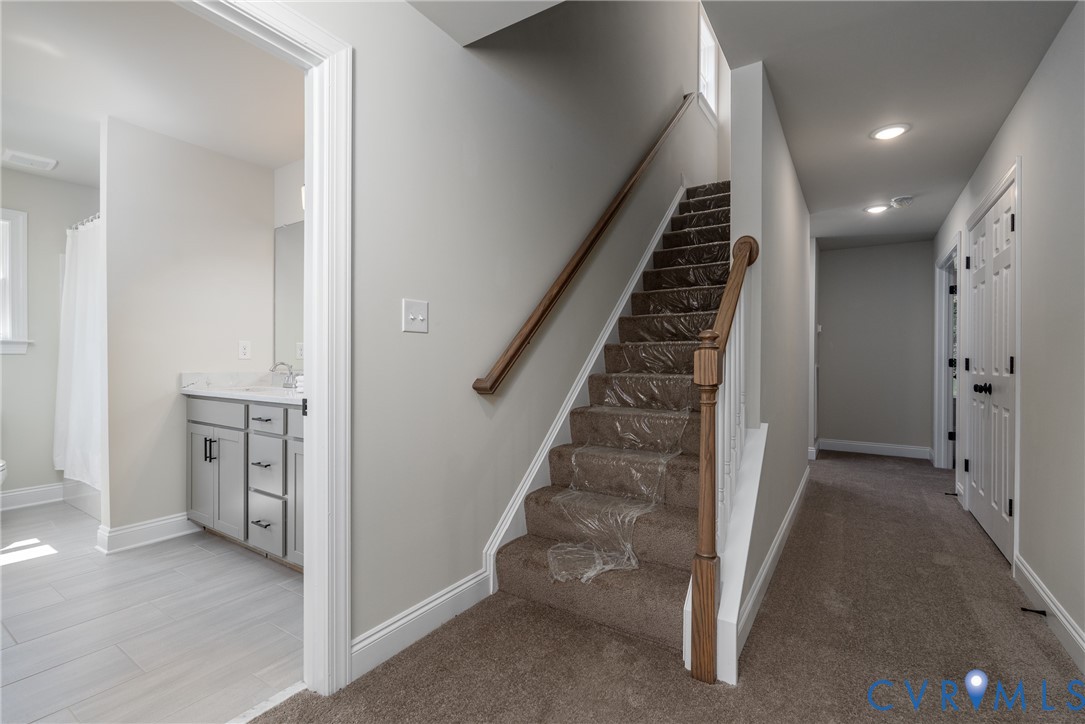 8365 Abbey Road Richmond, VA 23235 - Photo 30 of 53 2nd floor hallway & steps leading to 3rd floor