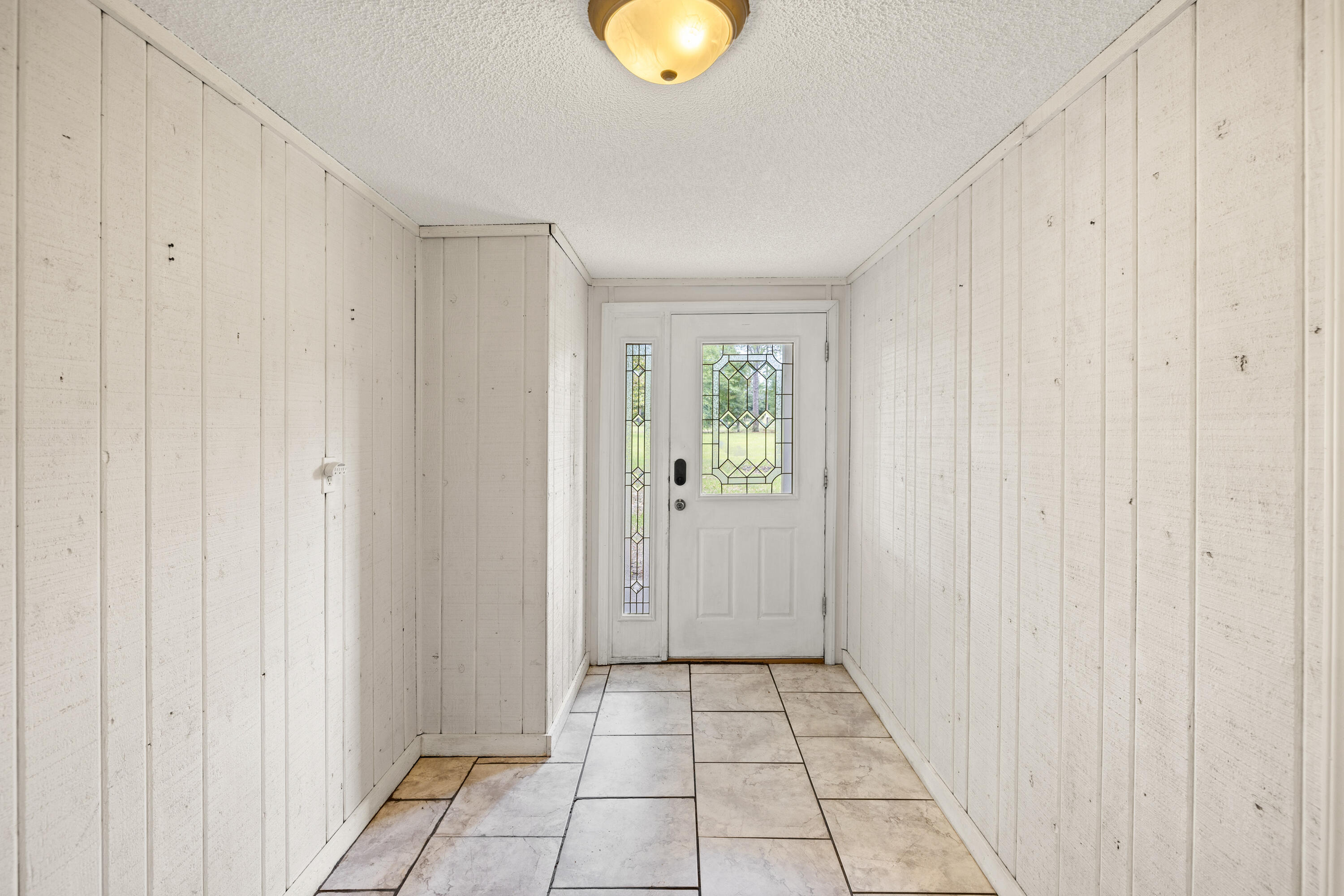 540 John King Road Crestview, FL 32539 - Photo 22 of 59 a view of an entryway with wooden floor