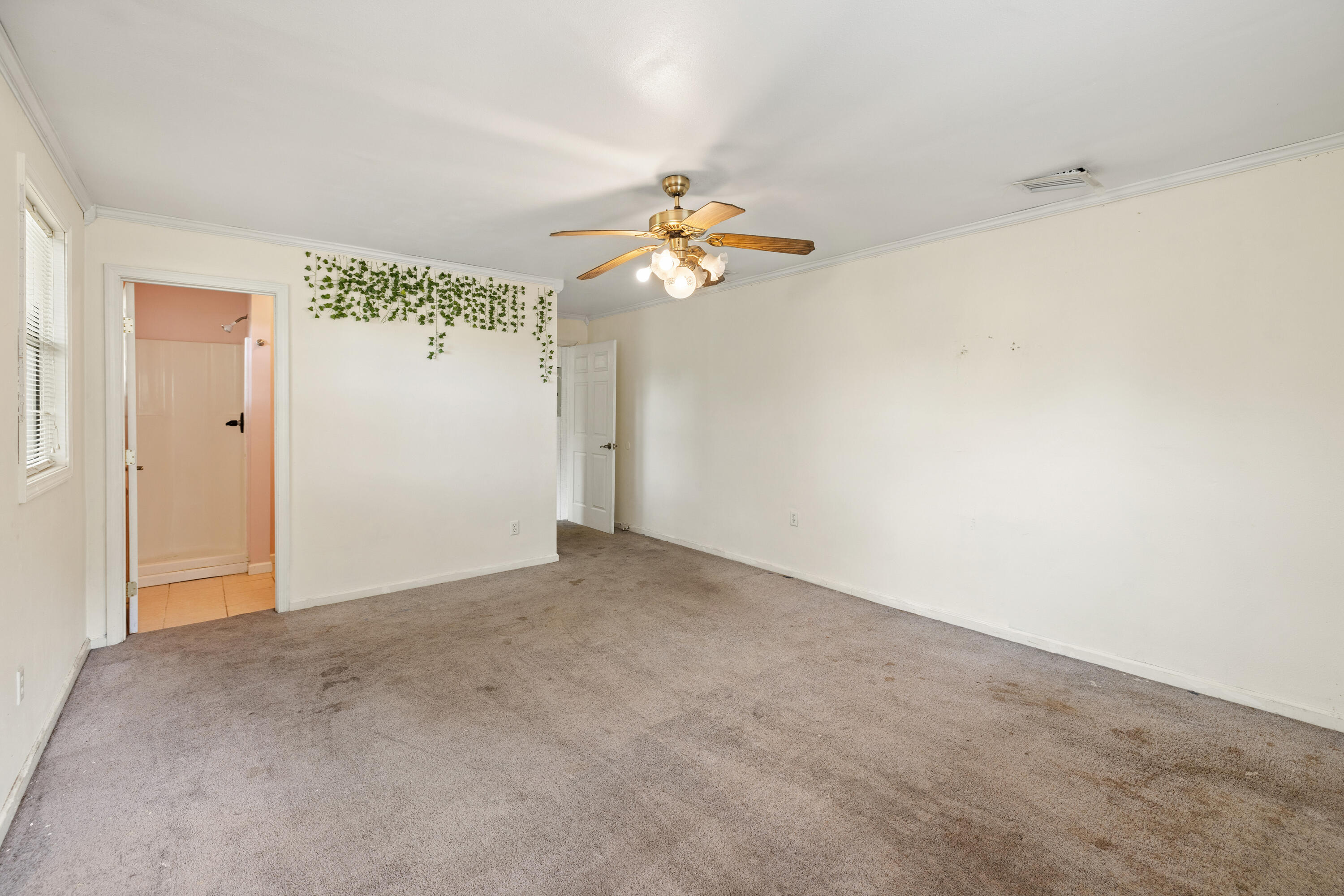 540 John King Road Crestview, FL 32539 - Photo 34 of 59 a view of a room with a ceiling fan and a chandelier fan