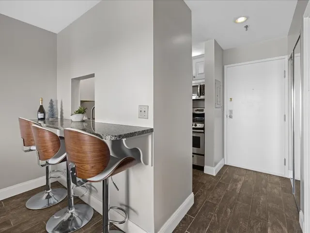 a bathroom with a toilet shower and a sink