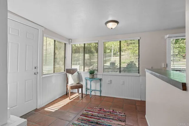 a view of livingroom with furniture and windows