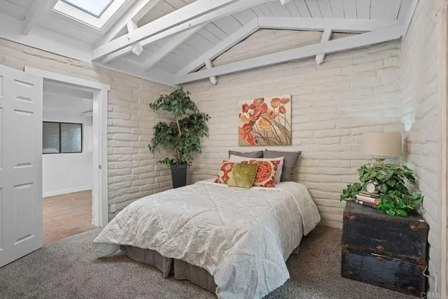 a view of room with window and wooden floor