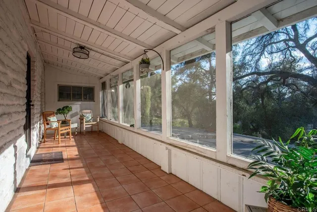 a house view with a couches in a patio