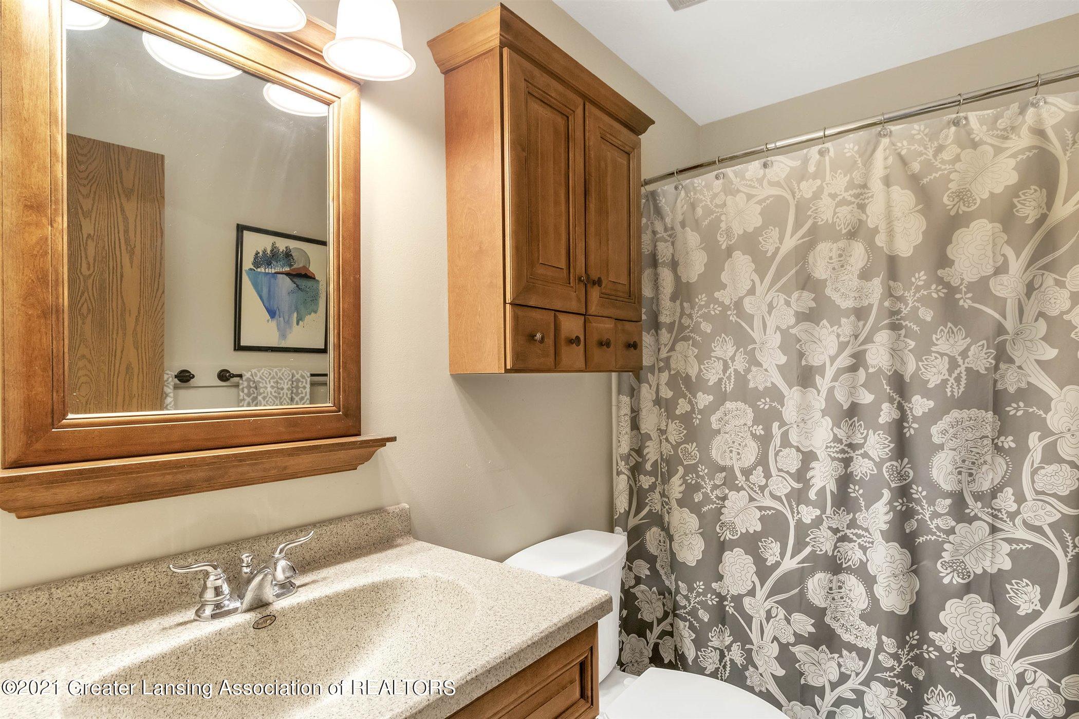 2089 East Lake Lansing Road, Unit 81 Haslett, MI 48840 - Photo 16 of 35 20-2089 Lake Lansing Rd-WindowStill-Real