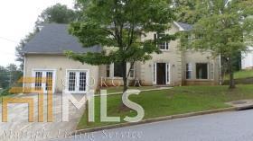 2915 Oakvale Falls Drive Decatur, GA 30034 - Photo 1 of 1 front view of a house with a yard