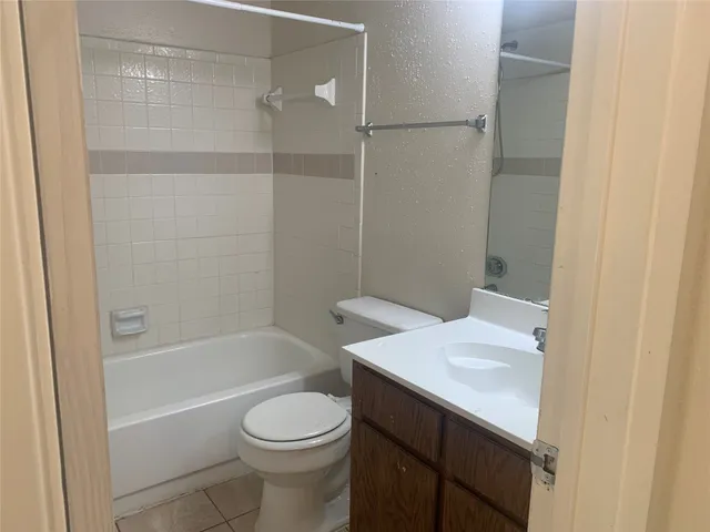 a view of swimming pool with outdoor seating and plants