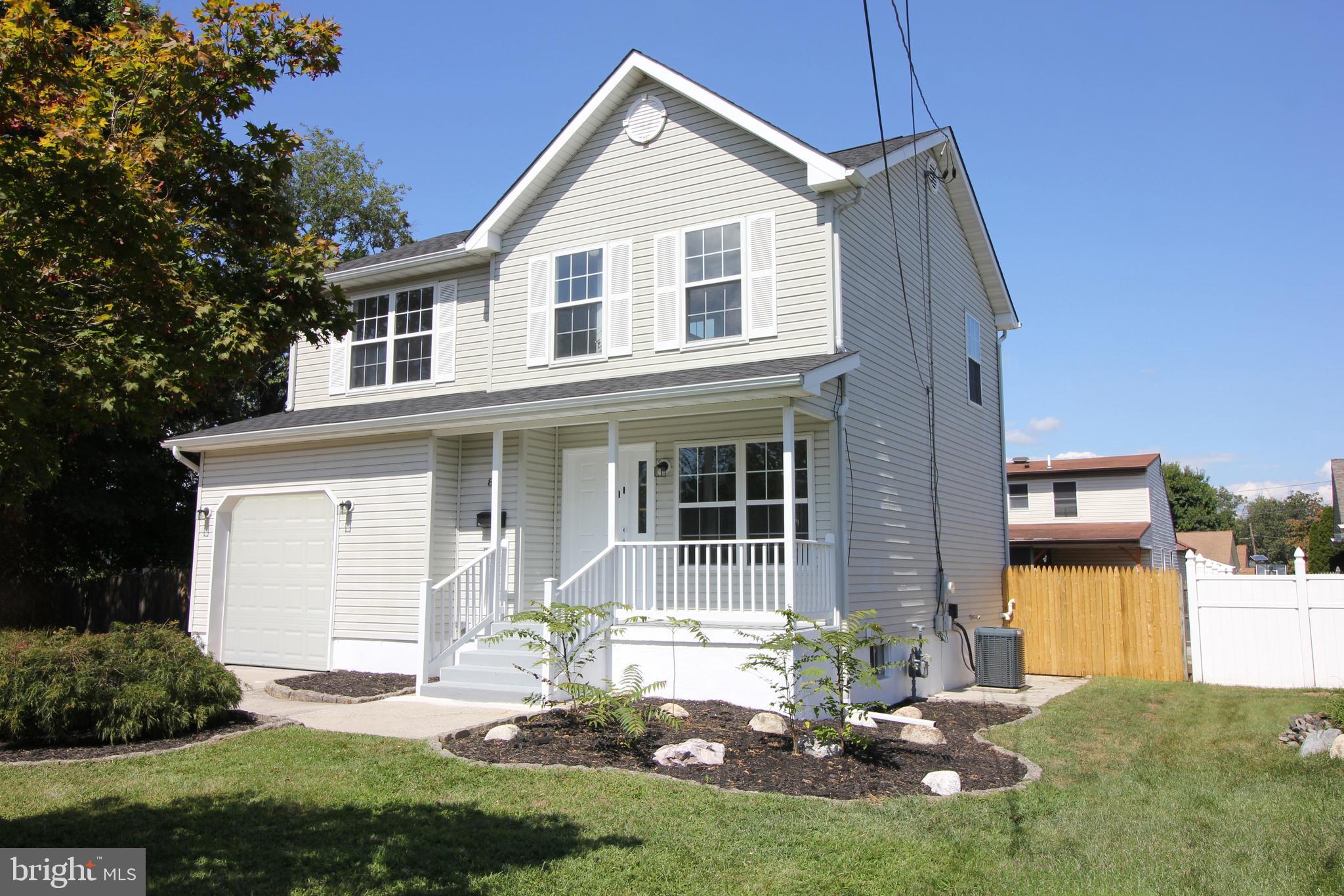 801 Taylor Street Riverside, NJ 08075 - Photo 2 of 34 a front view of a house with a yard