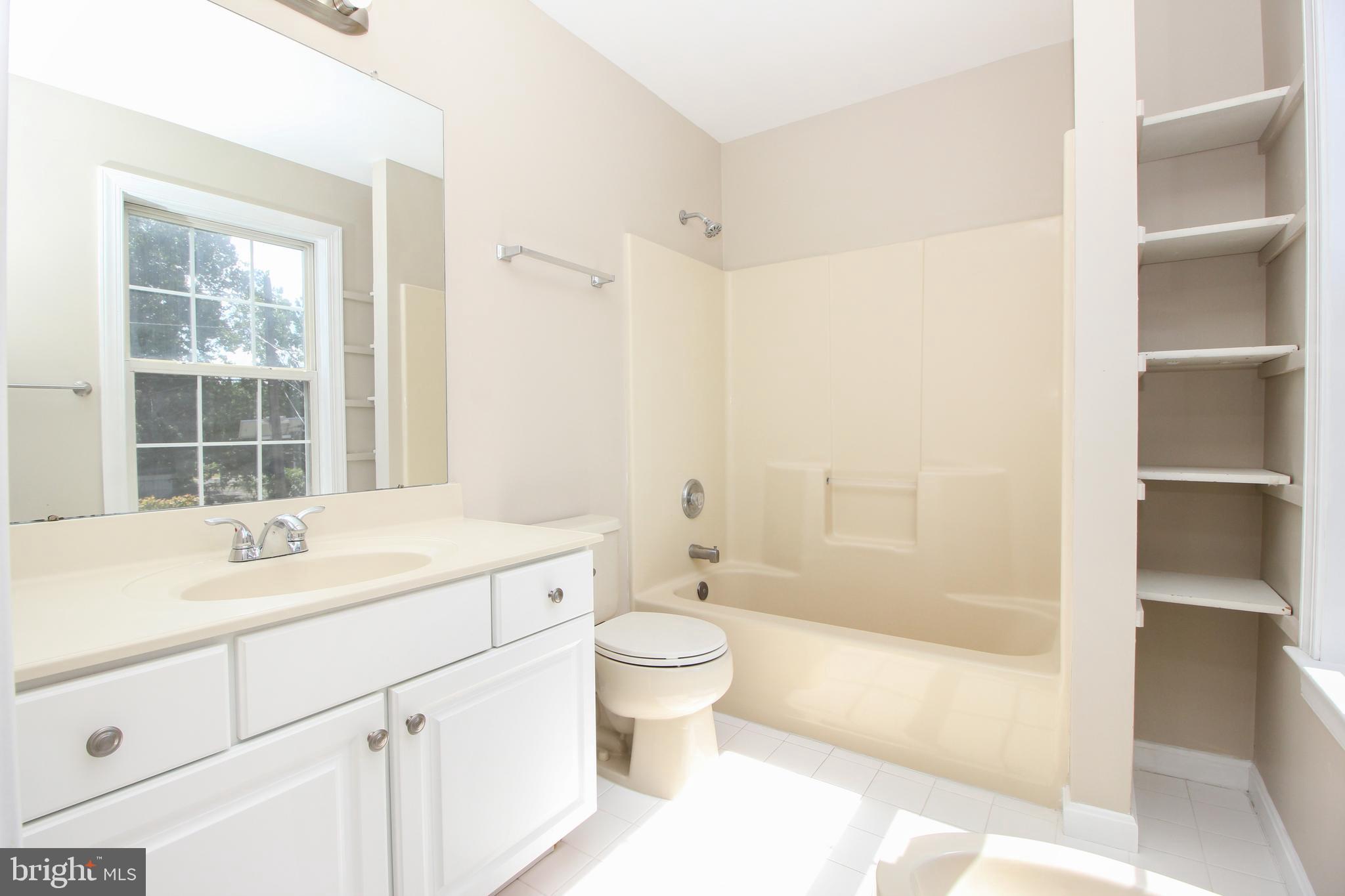 801 Taylor Street Riverside, NJ 08075 - Photo 25 of 34 a bathroom with a sink a toilet and shower