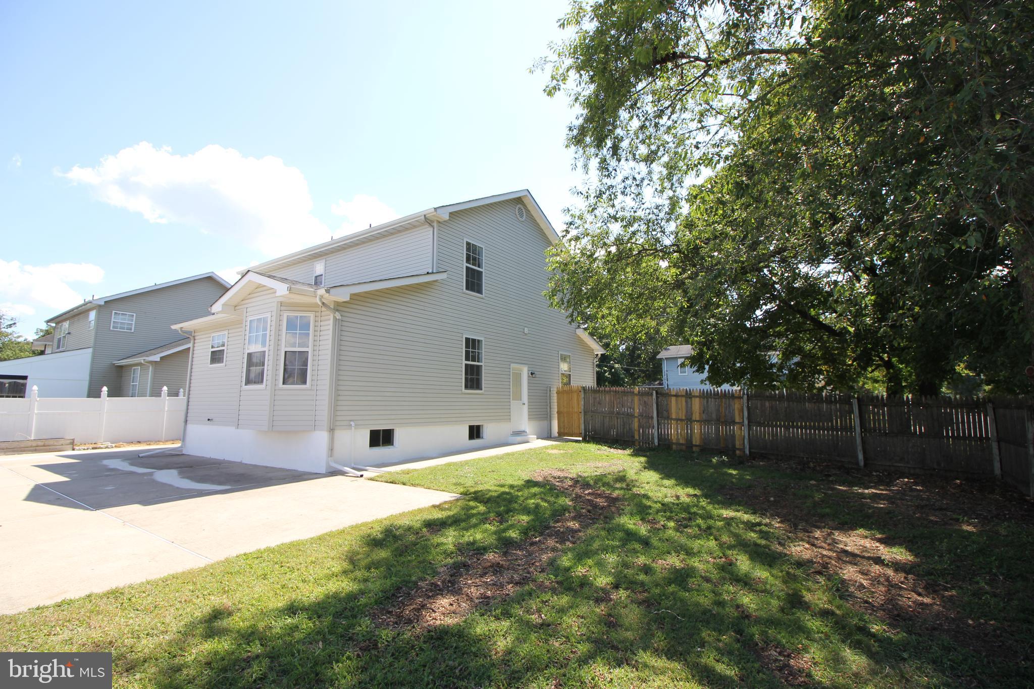801 Taylor Street Riverside, NJ 08075 - Photo 33 of 34 a front view of a house with a yard