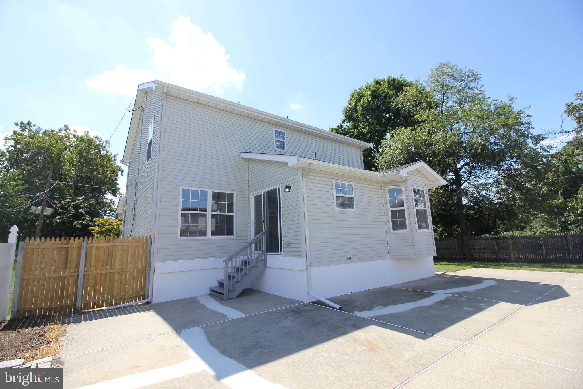801 Taylor Street Riverside, NJ 08075 - Photo 34 of 34 a view of backyard of house with wooden fence