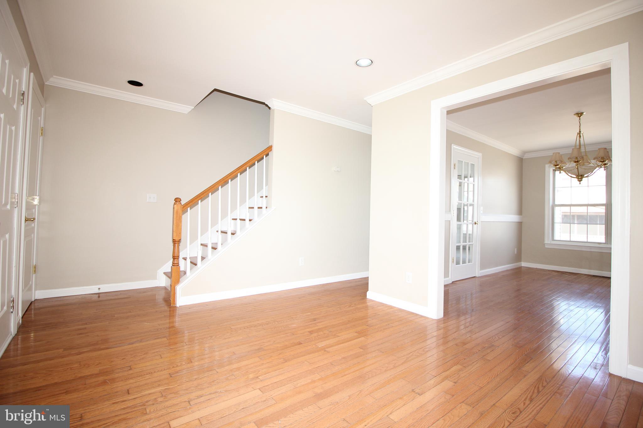 801 Taylor Street Riverside, NJ 08075 - Photo 5 of 34 a view of an entryway with wooden floor and windows