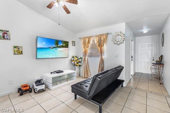 681-683 Alabama Road South, Unit 683 Lehigh Acres, FL 33974 - Photo 16 of 35 a living room with furniture and a flat screen tv