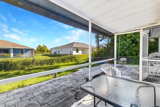 681-683 Alabama Road South, Unit 683 Lehigh Acres, FL 33974 - Photo 30 of 35 a view of swimming pool with seating