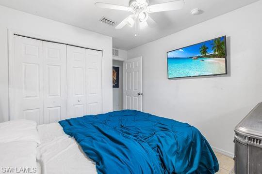 681-683 Alabama Road South, Unit 683 Lehigh Acres, FL 33974 - Photo 7 of 35 a bedroom with a bed and a painting on the wall