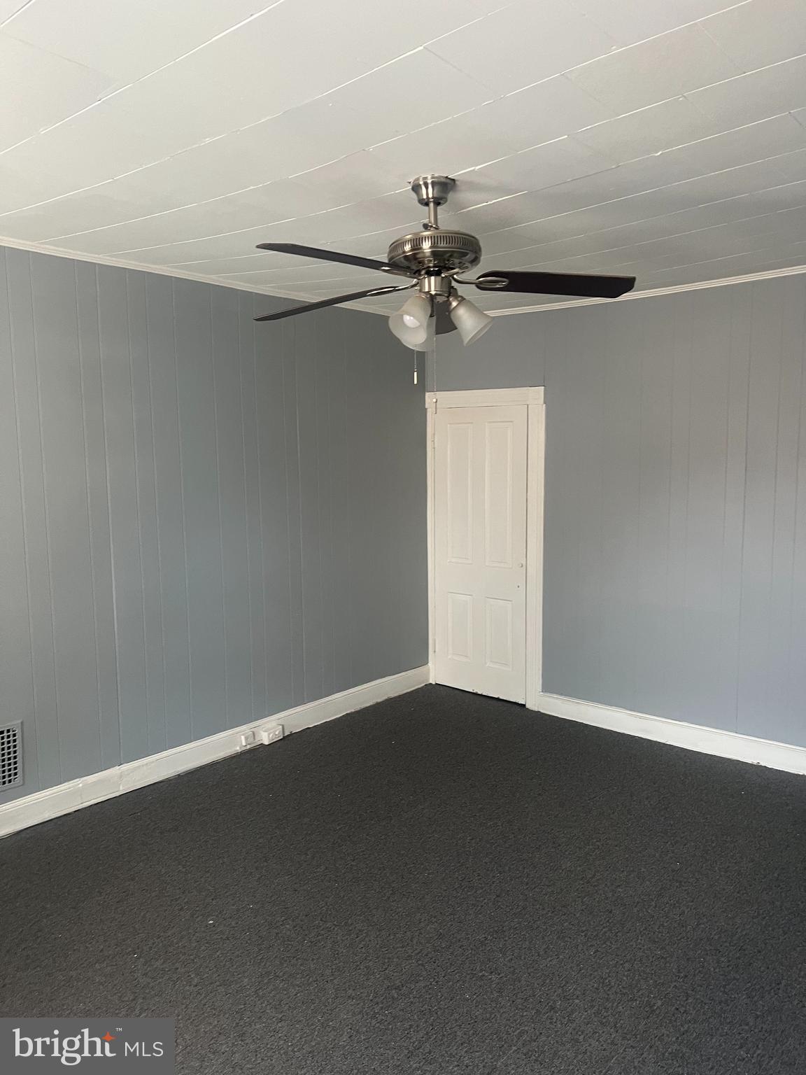 1812 North Payson Street Baltimore, MD 21217 - Photo 6 of 11 a view of a big room with carpet