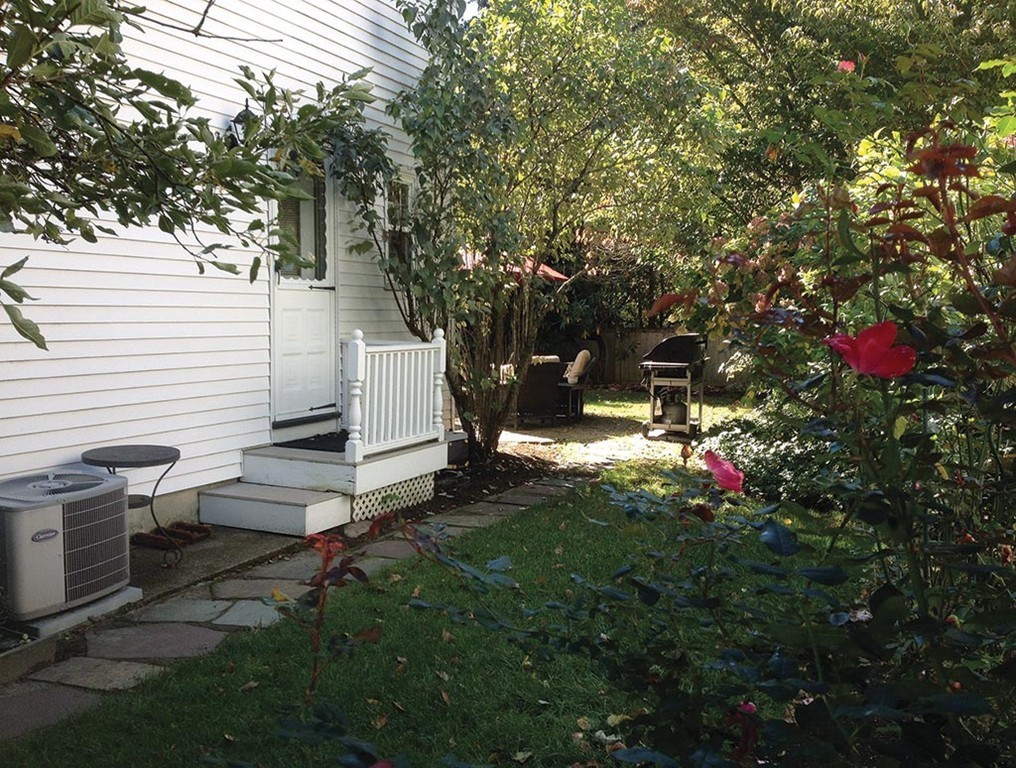 68 Bow Road Newton, MA 02459 - Photo 15 of 16 a view of a backyard with sitting area