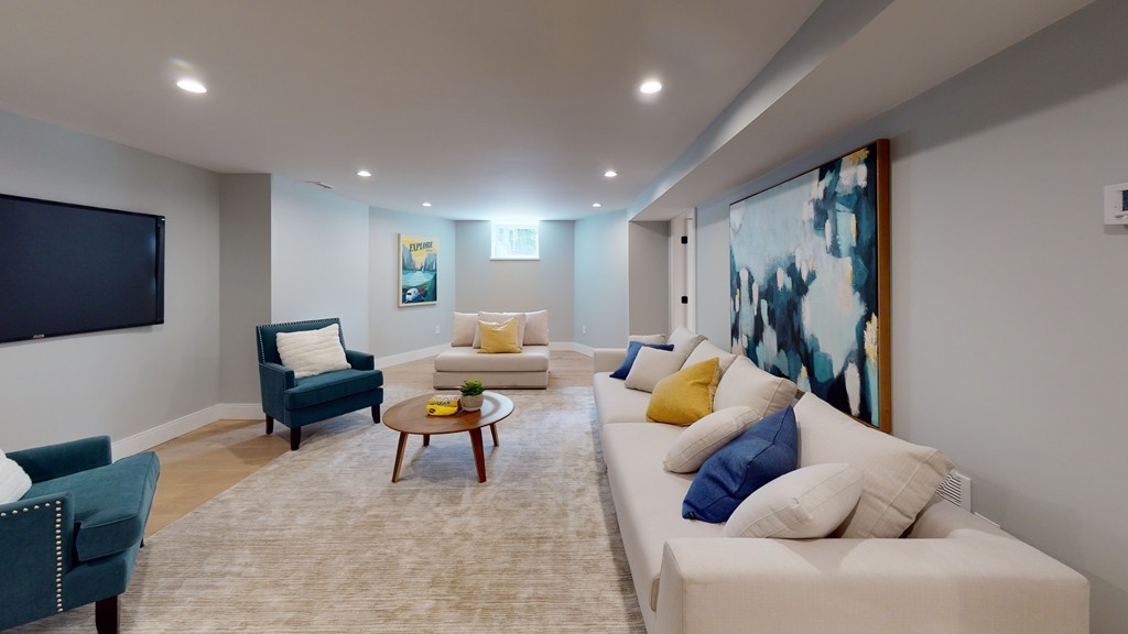 48 St John Street Boston, MA 02130 - Photo 11 of 25 a living room with furniture and a flat screen tv