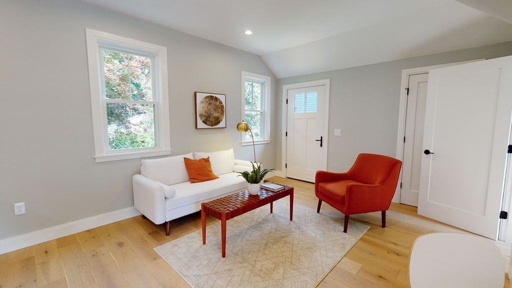 48 St John Street Boston, MA 02130 - Photo 15 of 25 a living room with furniture and a window