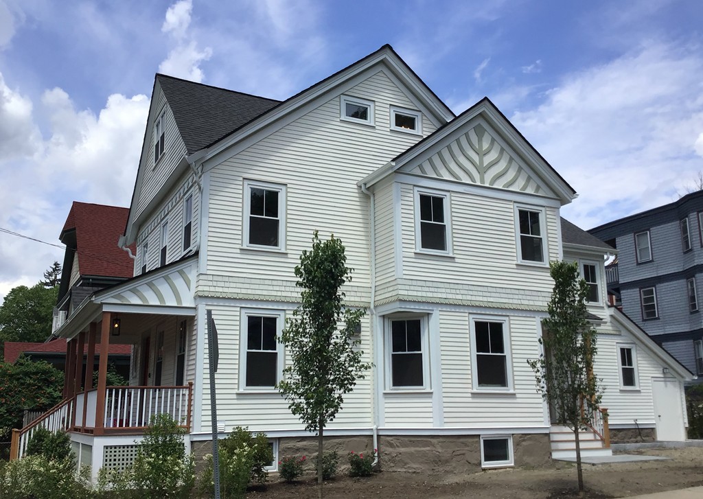 48 St John Street Boston, MA 02130 - Photo 20 of 25 a view of a house with a yard