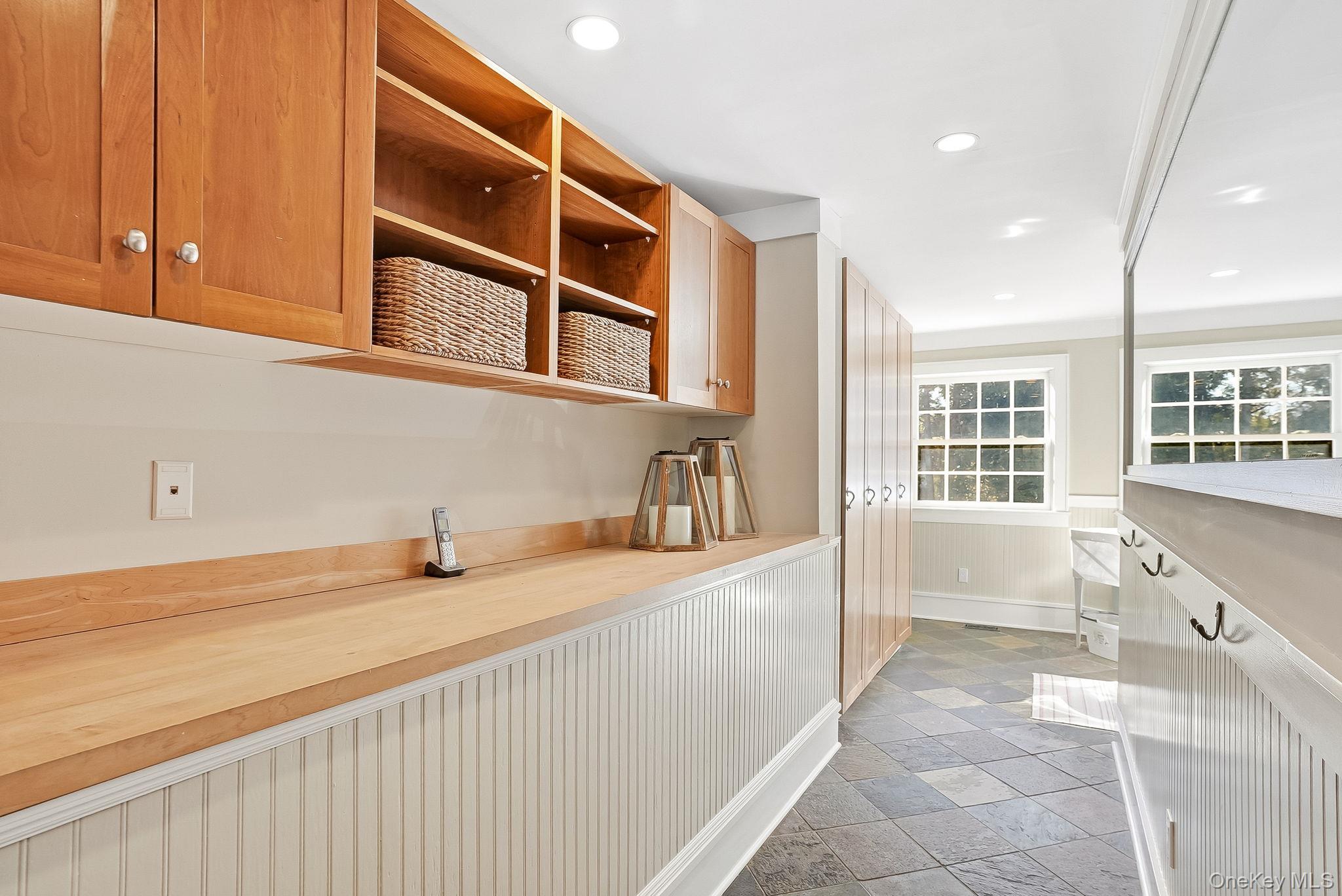 880 Forest Avenue Rye, NY 10580 - Photo 20 of 48 Mudroom with Custom Shelving, Laundry and Access to Garage