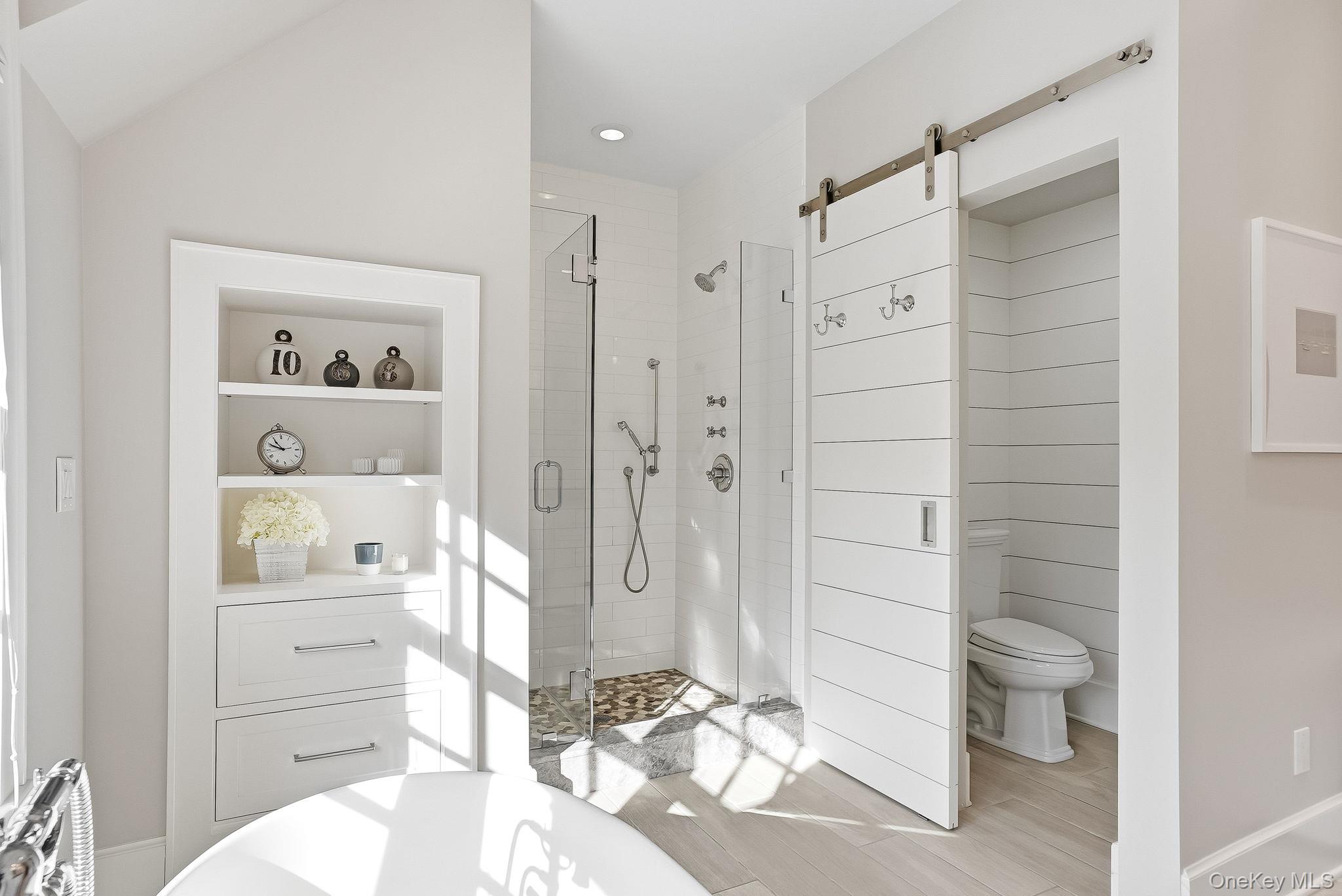 880 Forest Avenue Rye, NY 10580 - Photo 27 of 48 a bathroom with a shower toilet and sink