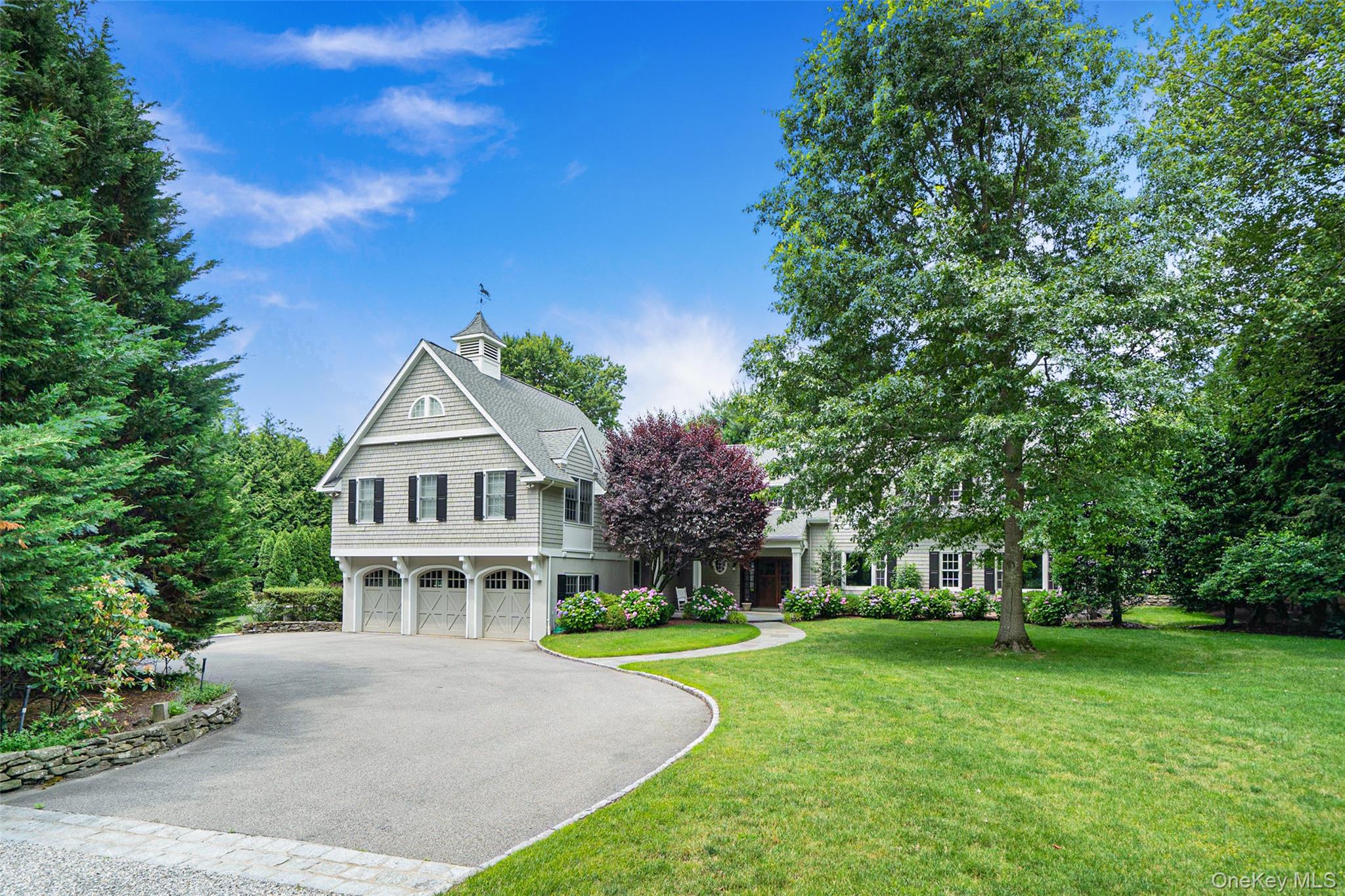 880 Forest Avenue Rye, NY 10580 - Photo 3 of 48 Front of Home and Driveway with Stone Apron