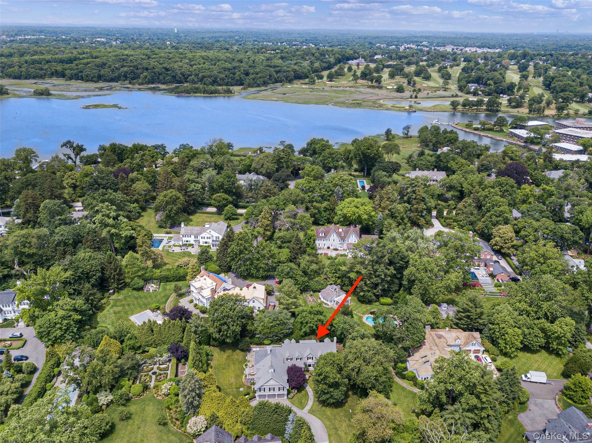 880 Forest Avenue Rye, NY 10580 - Photo 45 of 48 an aerial view of lake residential house with swimming pool and green space