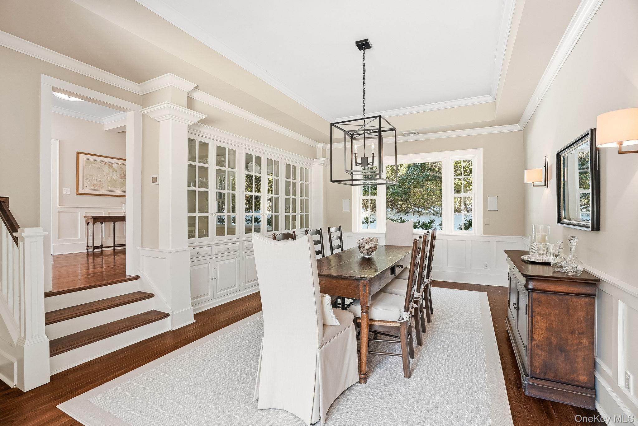 880 Forest Avenue Rye, NY 10580 - Photo 9 of 48 a view of a dining room with furniture window and wooden floor