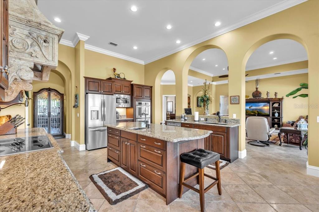 28959 Smugglers Lane Punta Gorda, FL 33982 - Photo 11 of 45 a large kitchen with a table and chairs