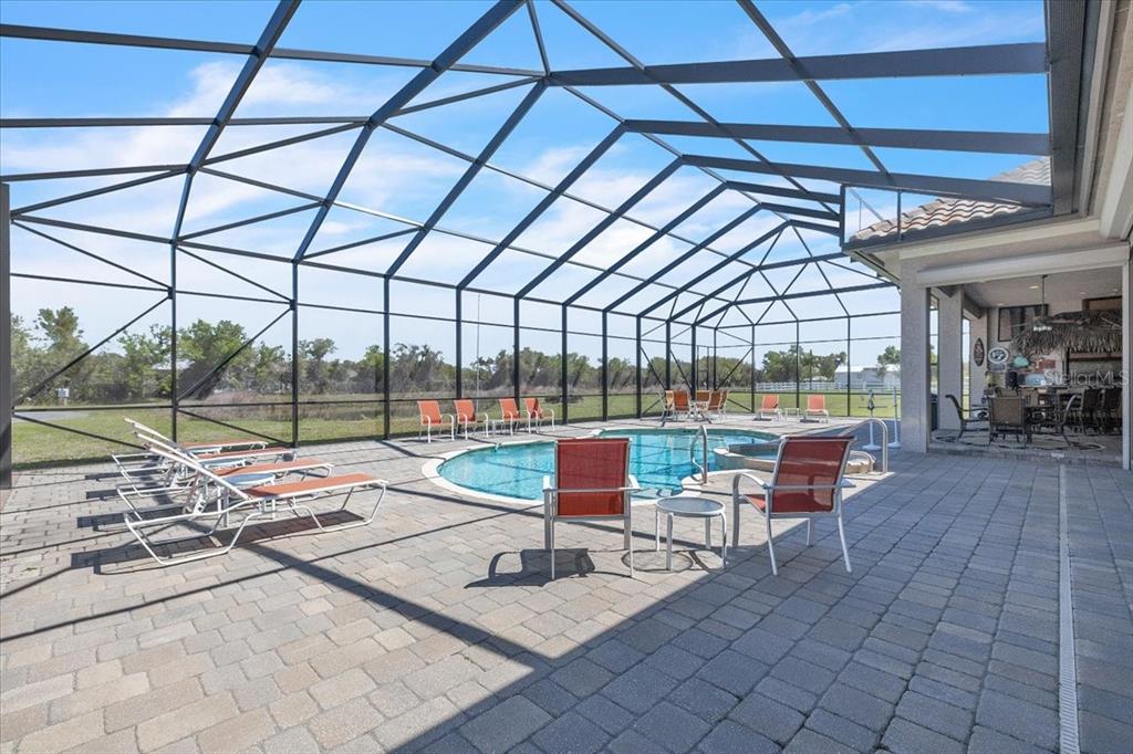 28959 Smugglers Lane Punta Gorda, FL 33982 - Photo 37 of 45 a view of a swimming pool with a patio