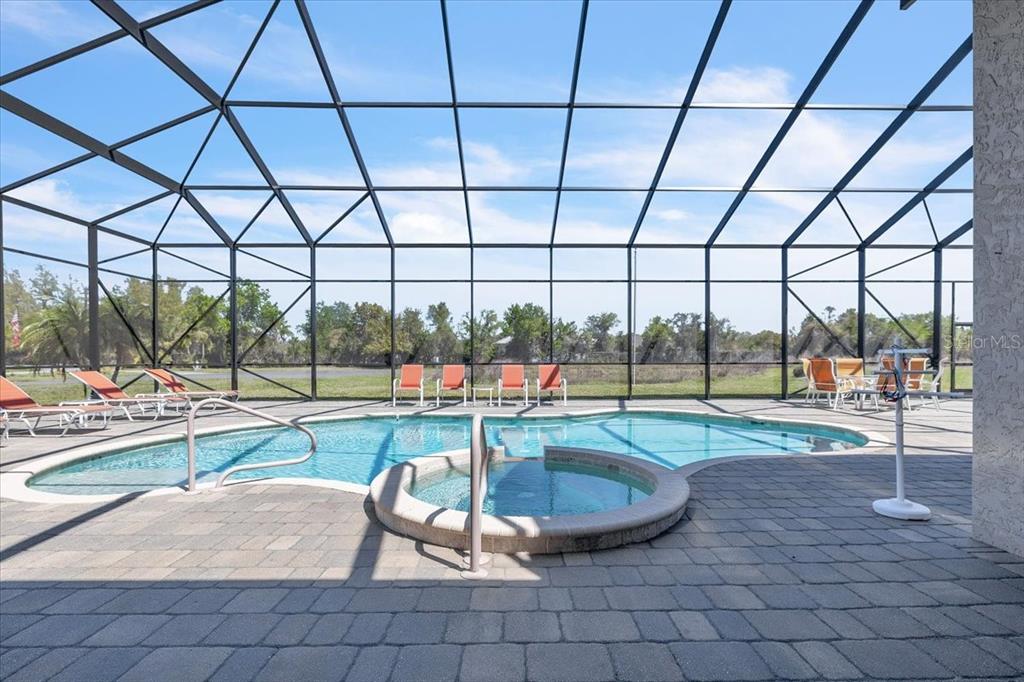28959 Smugglers Lane Punta Gorda, FL 33982 - Photo 38 of 45 a view of a swimming pool and a back yard