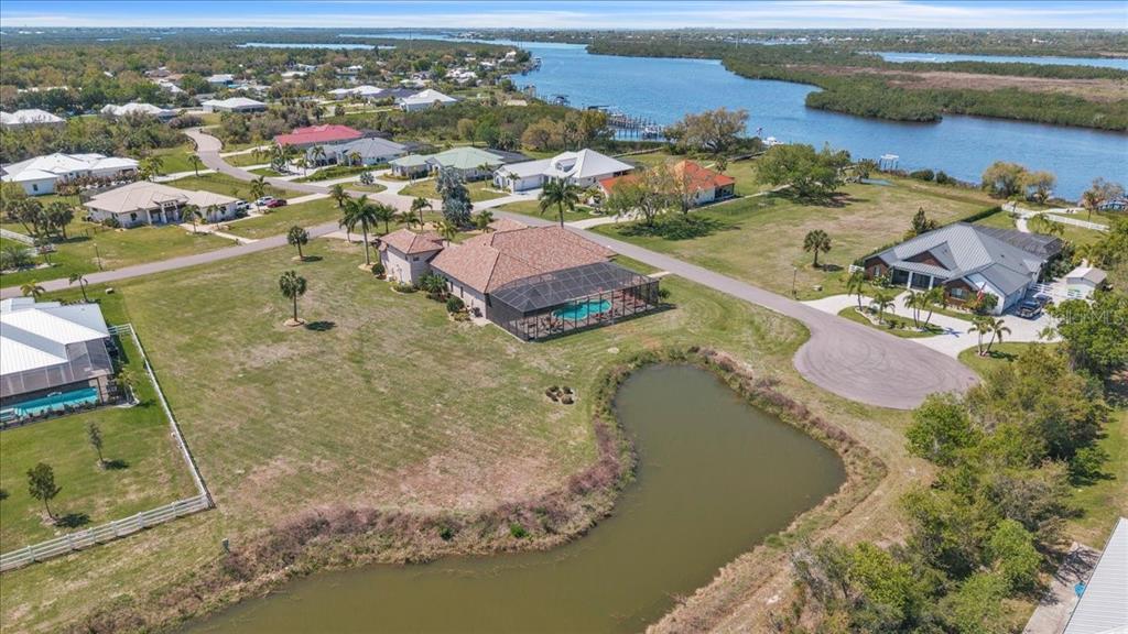28959 Smugglers Lane Punta Gorda, FL 33982 - Photo 40 of 45 an aerial view of residential houses with outdoor space