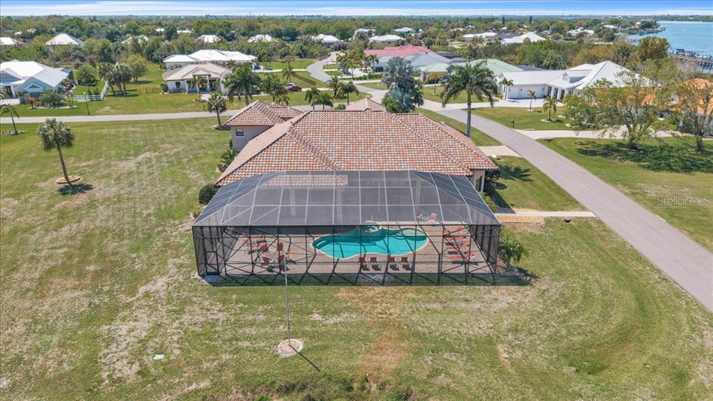 28959 Smugglers Lane Punta Gorda, FL 33982 - Photo 41 of 45 an aerial view of a house with a yard basket ball court and outdoor seating