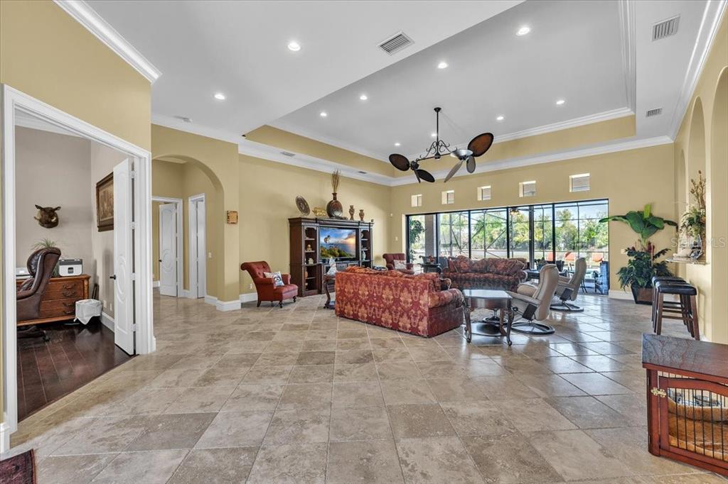 28959 Smugglers Lane Punta Gorda, FL 33982 - Photo 5 of 45 a lobby with furniture and a ceiling fan