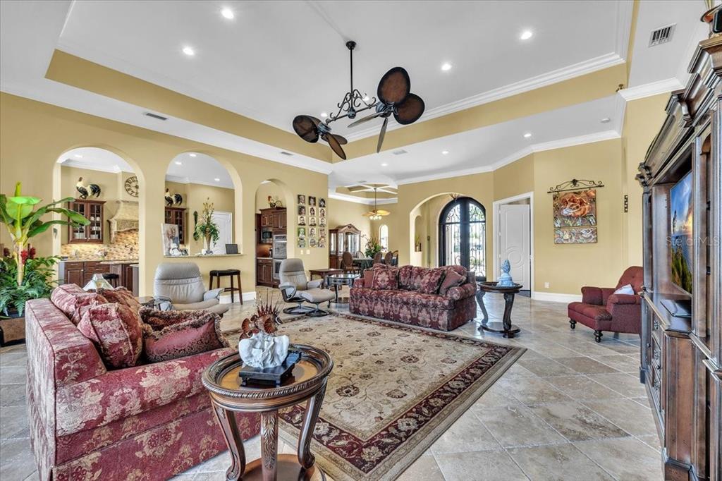 28959 Smugglers Lane Punta Gorda, FL 33982 - Photo 6 of 45 a living room with furniture potted plant and a large window